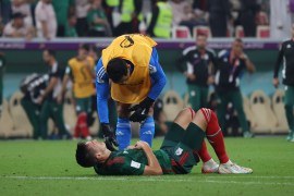Mexican players were distraught at the end of the match [Showkat Shafi/Al Jazeera]