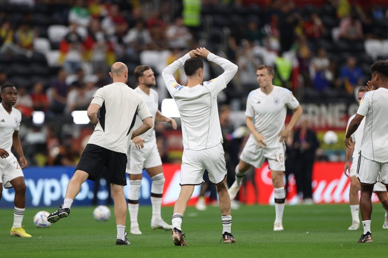 German players stretch ahead of crucial match against Spain