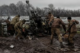Ukrainian soldiers fire a round from an M777 howitzer in the eastern Donetsk region [File: Serhii Nuzhnenko/Radio Free Europe via Reuters]