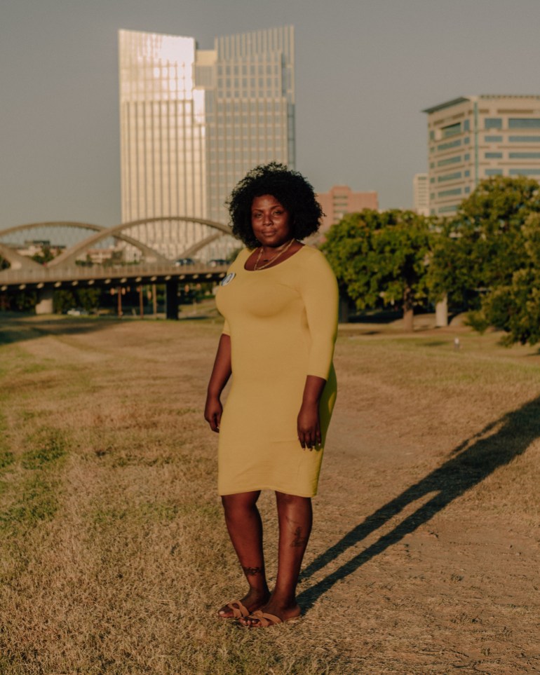 A woman stands in a park in Fort Worth, Texas