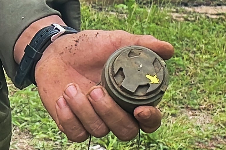 This handout photo from Amnesty International taken between June 27 and July 4, 2022 and released on July 20 shows an M14 landmine found by deminers in Kayah State in eastern Myanmar.