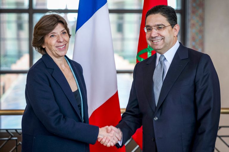 Morocco's Foreign Minister Nasser Bourita (right) receives his French counterpart Catherine Colonna in Rabat, on December 16 [Fadel Senna/AFP]