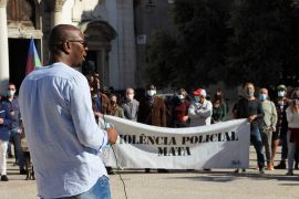 Prominent anti-racism activist Mamadou Ba speaks during a protest in Lisbon, Portugal