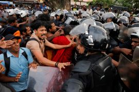 Demonstrators shout at Sri Lankan police officers during an anti-government protest by trade unions, student movements, and civil organisations, including the main opposition parties, amid the country's economic crisis, in Colombo, Sri Lanka, November 2, 2022. REUTERS/ Dinuka Liyanawatte