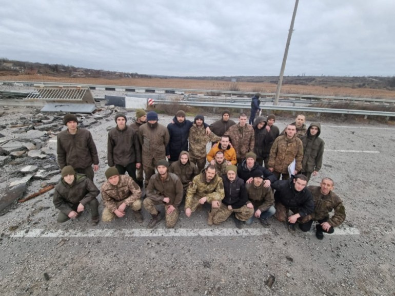 Ukrainian prisoners of war (POWs) pose after a swap, amid Russia's attack on Ukraine, in Zaporizhzhia region, Ukraine, November 24, 2022.