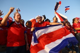 Costa Rica fans celebrate outside the stadium after the match [File: Bernadett Szabo/Reuters]