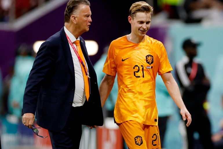 Netherlands' Frenkie de Jong with coach Louis van Gaal after being substituted