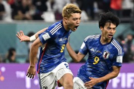 Japan&#39;s Ritsu Doan celebrates scoring their first goal against Spain with Kaoru Mitoma [Dylan Martinez/Reuters]
