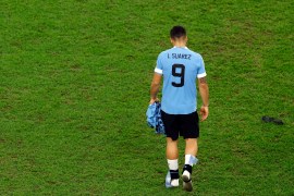 Uruguay&#39;s Luis Suarez looks dejected after Uruguay were eliminated from the World Cup. This was almost certainly his last World Cup appearance. [Albert Gea/Reuters]