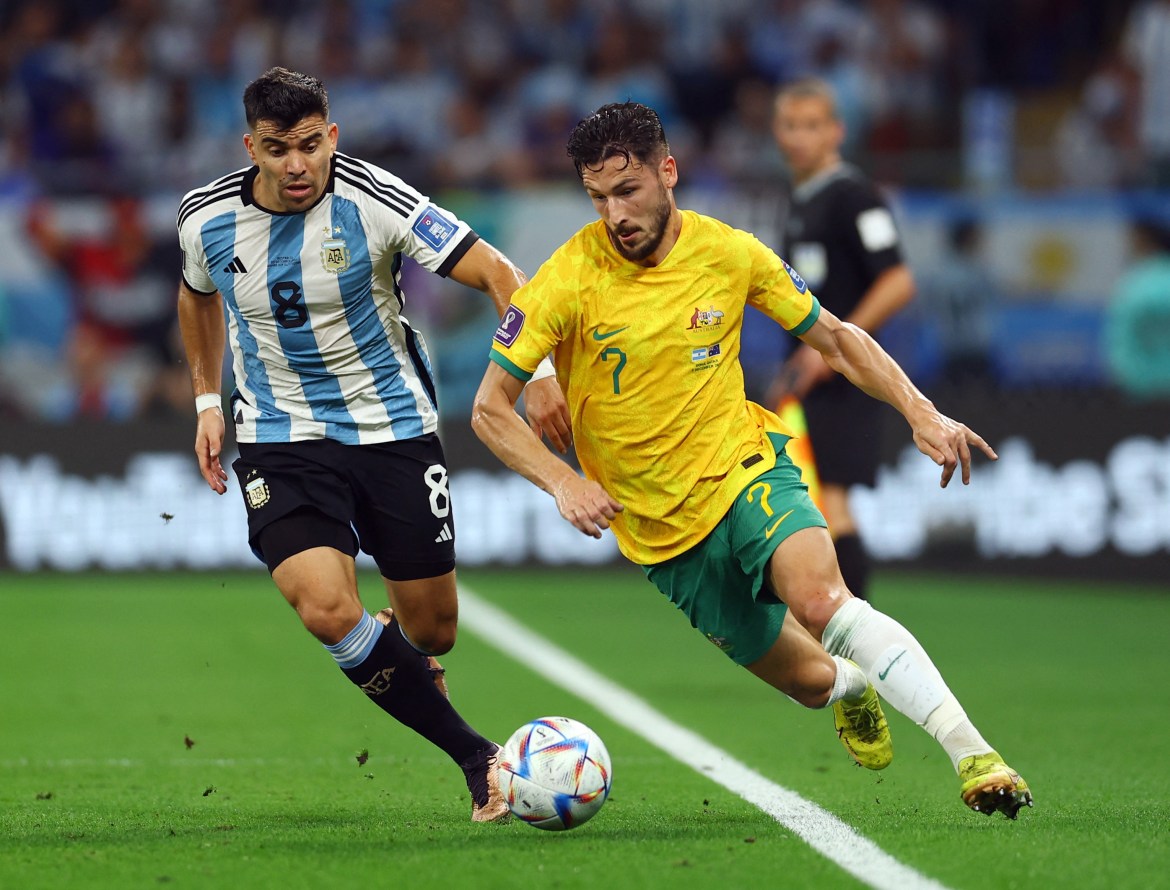 Mathew Leckie in action with Argentina's Marcos Acuna