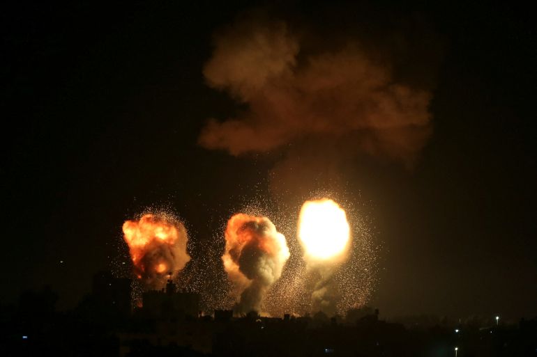 Smoke and flames rise during an Israeli air attack in the Gaza Strip, December 4, 2022.