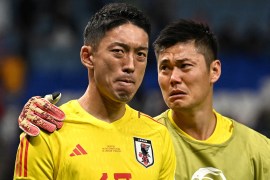 Soccer Football - FIFA World Cup Qatar 2022 - Round of 16 - Japan v Croatia - Al Janoub Stadium, Al Wakrah, Qatar - December 5, 2022 Japan's Shuichi Gonda and Eiji Kawashima look dejected after the penalty shootout as Japan are eliminated from the World Cup REUTERS/Dylan Martinez TPX IMAGES OF THE DAY