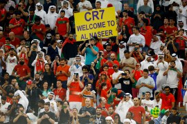 Soccer Football - FIFA World Cup Qatar 2022 - Round of 16 - Portugal v Switzerland - Lusail Stadium, Lusail, Qatar - December 6, 2022 Fans hold up a sign inside the stadium with a message welcoming Cristiano Ronaldo to Al-Nassr due to his prospective transfer REUTERS/John Sibley