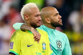 Soccer Football – FIFA World Cup Qatar 2022 – Quarter Final – Croatia v Brazil – Education City Stadium, Doha, Qatar – December 9, 2022 Brazil’s Dani Alves and Neymar look dejected after being eliminated from the World Cup REUTERS/Matthew Childs