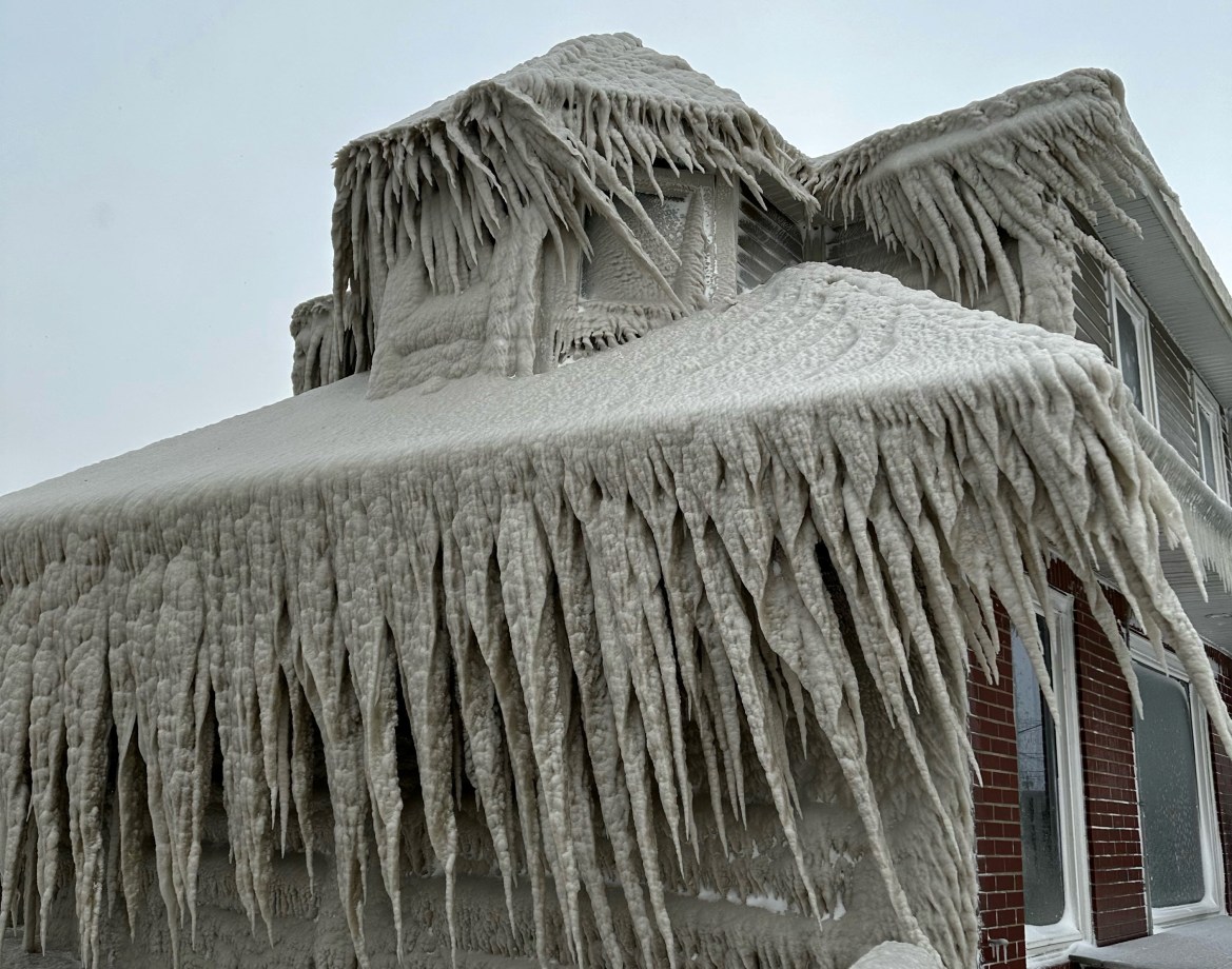 Hoak's restaurant is covered in ice from the spray of Lake Erie waves during a winter storm that hit the Buffalo region in Hamburg, New York