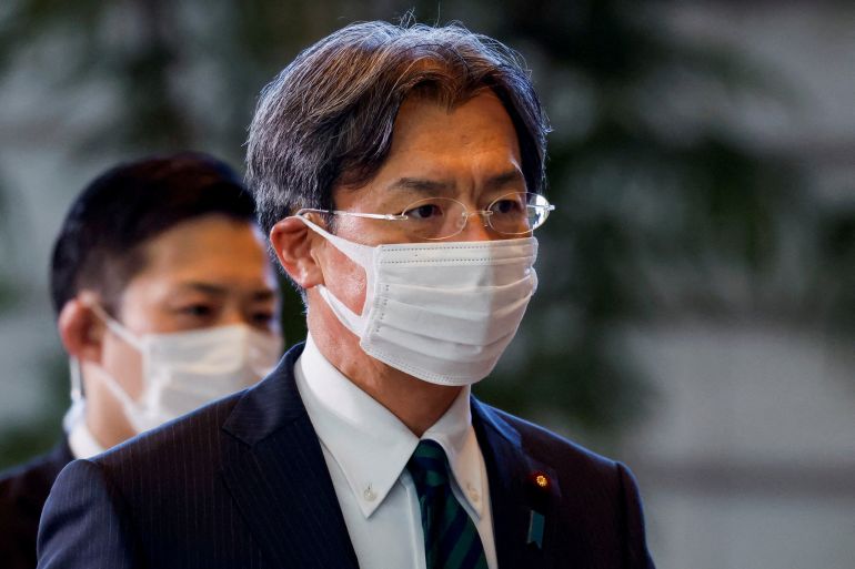 FILE PHOTO: Japan's Reconstruction Minister Kenya Akiba arrives at Prime Minister Fumio Kishida's official residence in Tokyo, Japan August 10, 2022. REUTERS/Issei Kato/File Photo