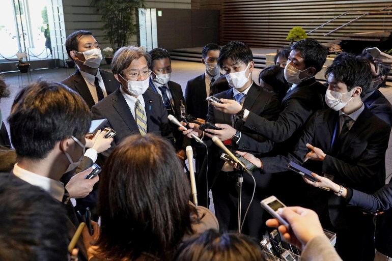 Japan's Reconstruction Minister Kenya Akiba speaks to media as he announces his resignation at Prime Minister Fumio Kishida's official residence in Tokyo, Japan December 27, 2022, in this photo taken by Kyodo. Mandatory credit Kyodo via REUTERS ATTENTION EDITORS - THIS IMAGE WAS PROVIDED BY A THIRD PARTY. MANDATORY CREDIT. JAPAN OUT. NO COMMERCIAL OR EDITORIAL SALES IN JAPAN