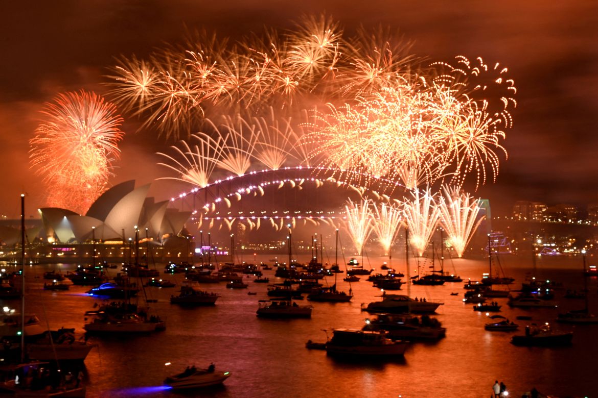 Fireworks explode over Sydney Harbour.