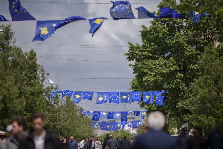 EU and Kosovo flags in Pristina