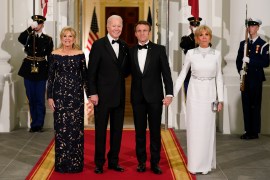 US President Joe Biden and first lady Jill Biden pose for photos with French President Emmanuel Macron and his wife Brigitte Macron as they arrive for a State Dinner at the White House in Washington, Thursday, December 1, 2022 [Patrick Semansky/AP Photo]