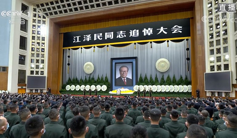 Live broadcast shows the memorial for the late former Chinese President Jiang Zemin at the Great Hall of the People in Beijing, China.