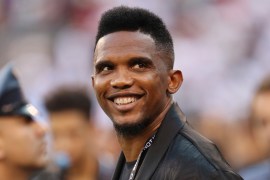 Cameroon Football Federation President Samuel Eto&#39;o was filmed kicking a man to the ground in an altercation outside a World Cup stadium [Steve Luciano/AP Photo]