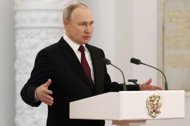Russian President Vladimir Putin delivers a speech during a ceremony