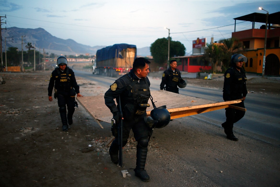Police clear the Pan-American North highway
