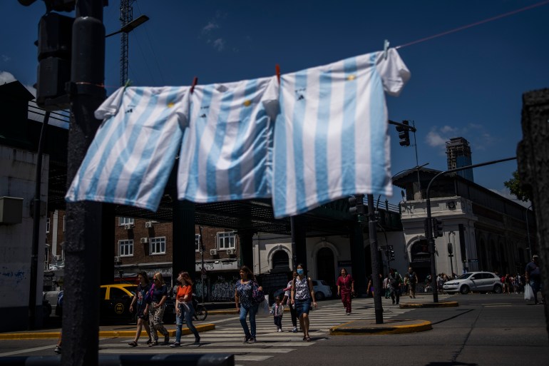 Argentina football jerseys hang for sale ahead of the team's World Cup final against France