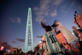 Argentine soccer fans attend a rally in support of the national soccer team at the iconic Obelisk landmark, a day ahead of the World Cup final against France, in Buenos Aires, Argentina, Saturday, Dec. 17, 2022. (AP Photo/Matilde Campodonico)