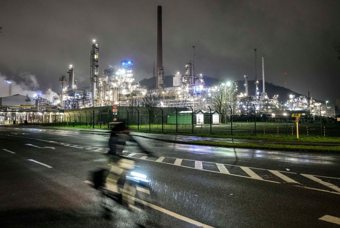 A worker leaves a BP refinery in Gelsenkirchen, Germany,