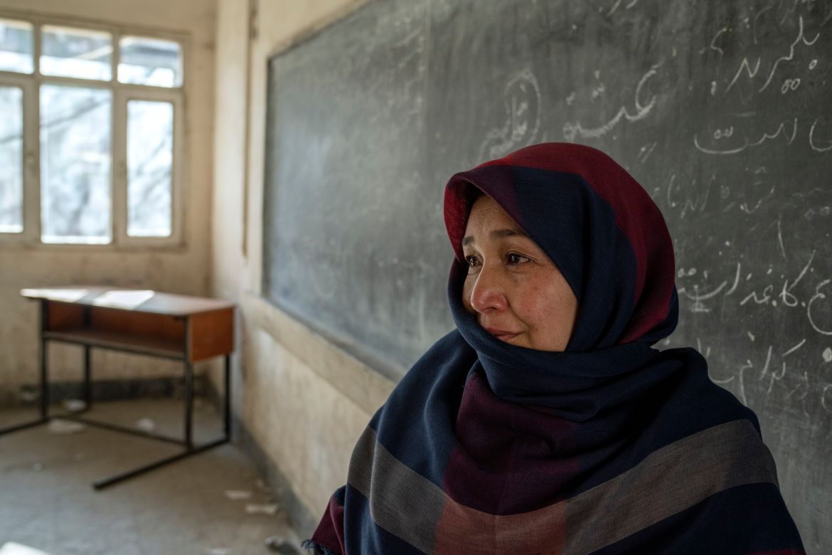 Amanah Nashenas, 45-year-old an Afghan teacher, cries during an interview.