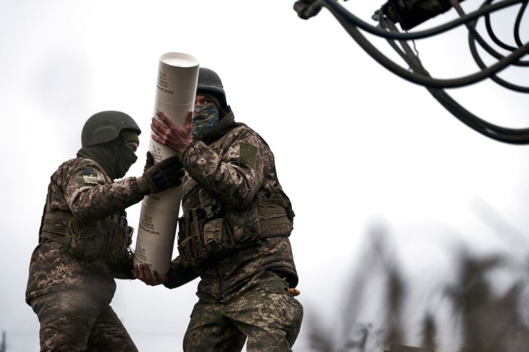 Ukrainian soldiers prepare to fire a French-made CAESAR self-propelled howitzer towards Russian positions near Avdiivka, Donetsk region, Ukraine, Dec. 26, 2022