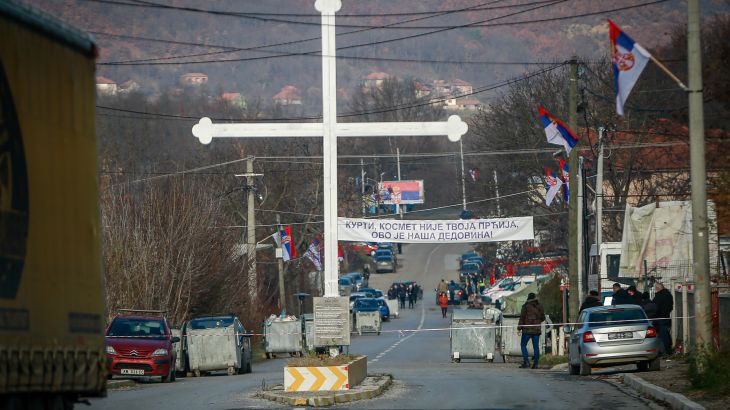 Serb protesters stand at the barricade near the village of Rudare, close to Zvecan, near the northern, Serb-dominated part of ethnically divided town of Mitrovica, Kosovo,