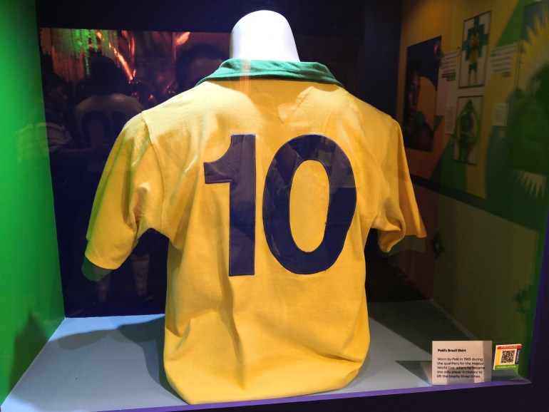 Pele's famous jersey on display at the exhibition on South American football in Doha on November 30, 2022 [Hafsa Adil/Al Jazeera] 