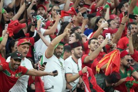 Morocco football fans cheer their team during their winning Group F match against Canada in the FIFA World Cup on December 1, 2022 at Al Thumama Stadium in Qatar [Sorin Furcoi/Al Jazeera]