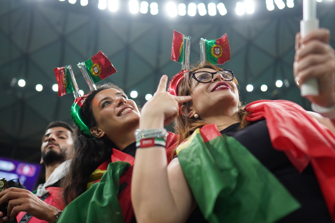 Portugal's fans celebrate their team's victory over Switzerland to move on to the quarter-finals.
