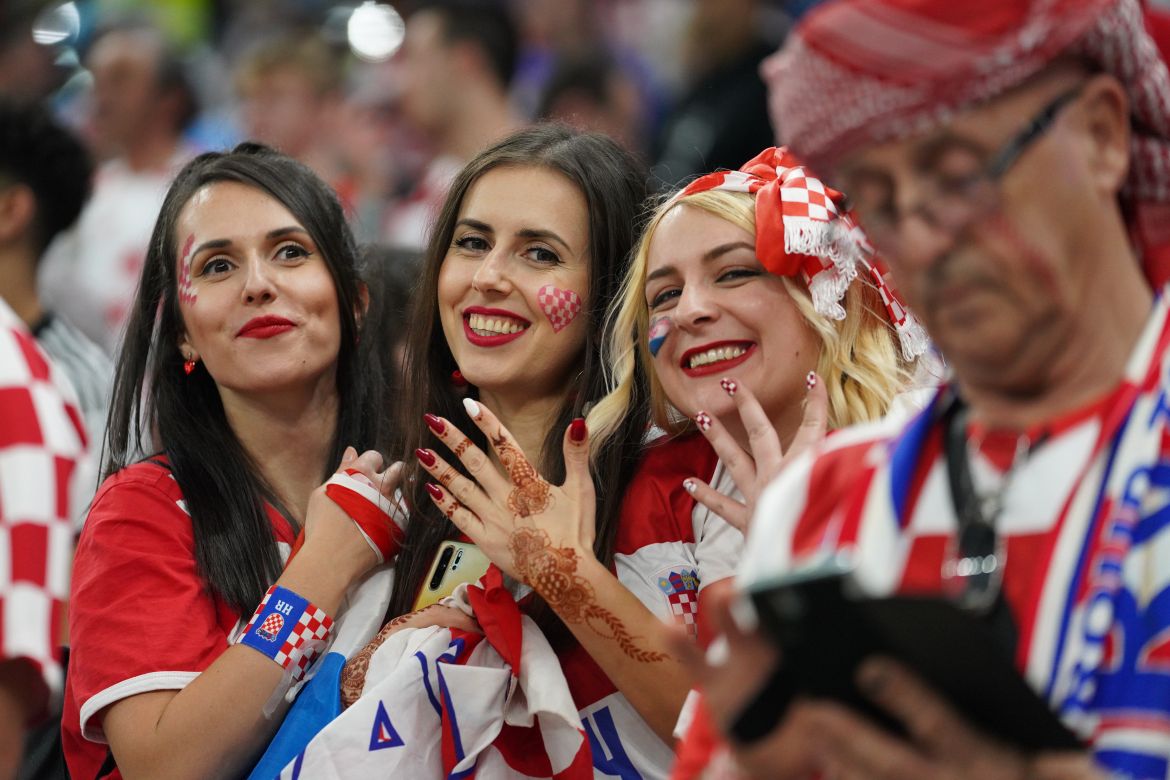 Croatia fans celebrate in the stands before the match.
