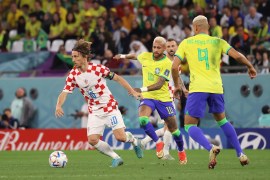 Croatia&#39;s Luka Modric and Brazil&#39;s Neymar in action during the match. [Showkat Shafi/Al Jazeera]