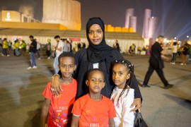 Khadija Suleiman from Ethiopia with her three children at Lusail Stadium for a recent late night game (Hafsa Adil/Al Jazeera)