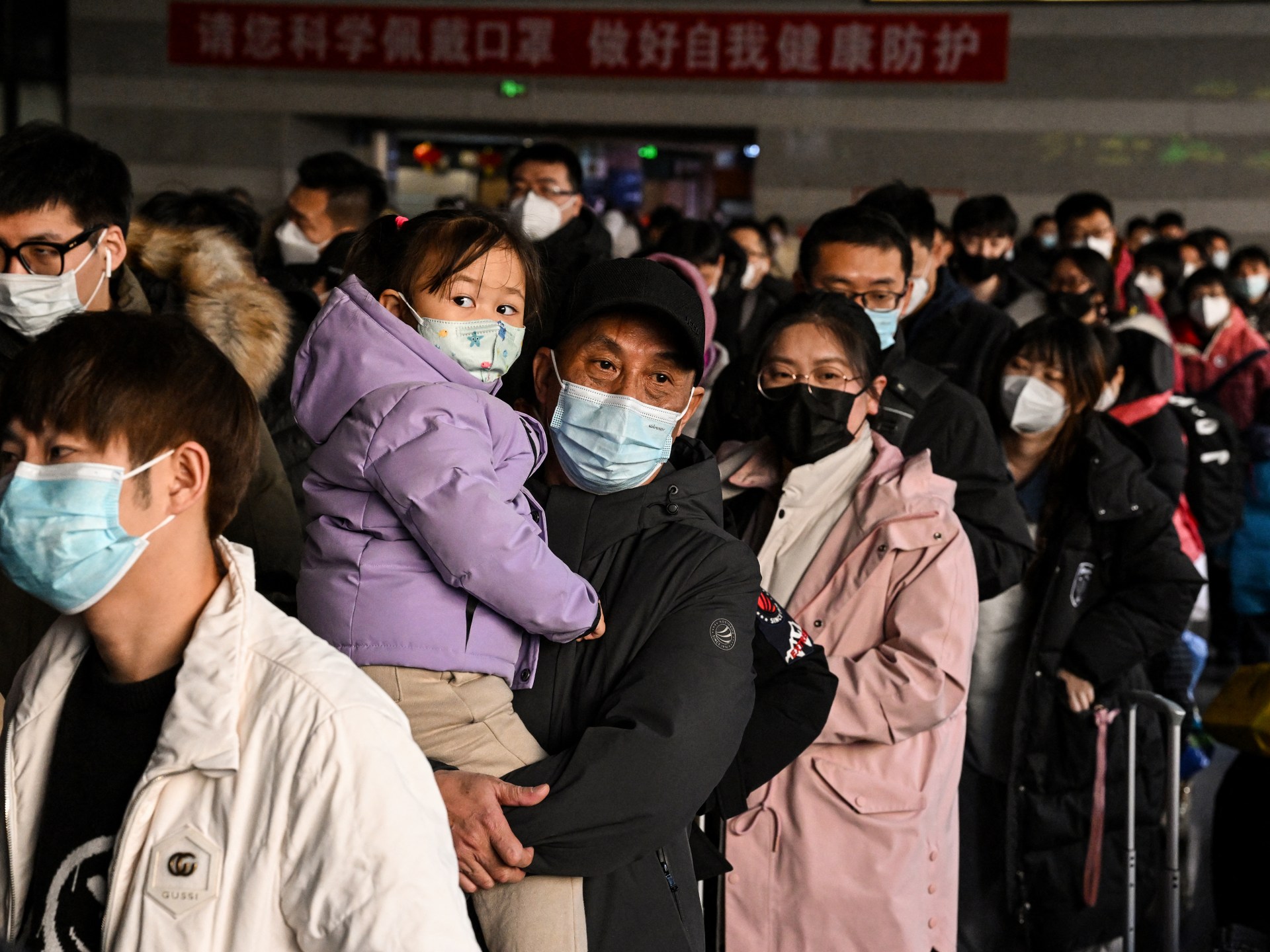 China says COVID outbreak has contaminated 80 % of inhabitants