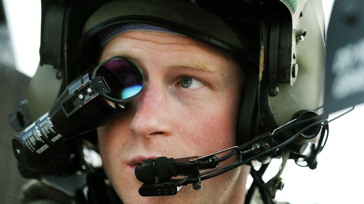 Britain's Prince Harry wears his monocle gun sight as he sits in his Apache helicopter at Camp Bastion, southern Afghanistan.