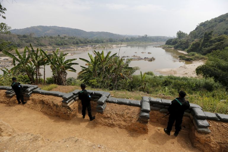 Thai soldiers stand guard at Ban Kaen Kai operation base on the Mekong river at the border between Thailand and Laos in 2016 - part of the region, known as the Golden Triangle