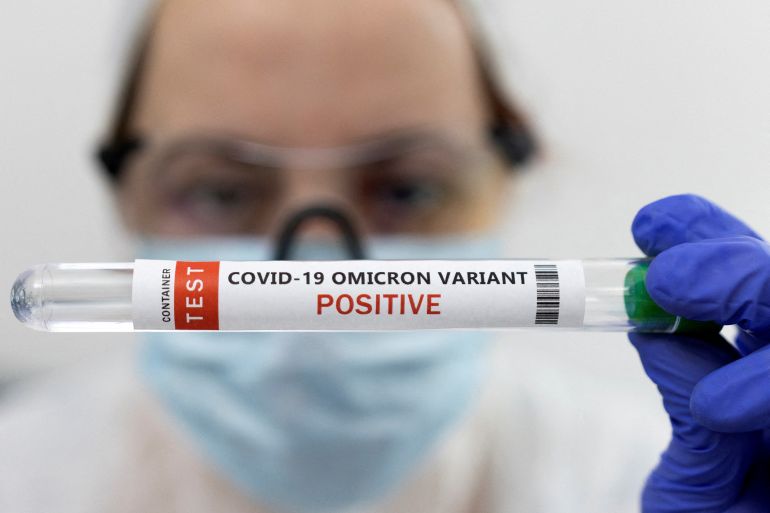 Test tube labelled "COVID-19 Omicron variant test positive" is seen in this illustration picture taken January 15, 2022