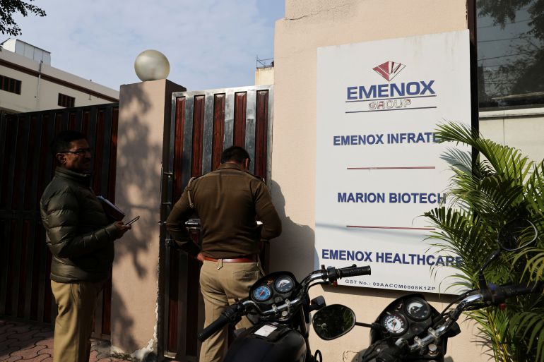 Police is seen at the gate of an office of Marion Biotech, a healthcare and pharmaceutical company and a part of the Emenox Group, whose cough syrup has been linked to the deaths of children in Uzbekistan, in Noida, India, December 29, 2022. REUTERS/Anushree Fadnavis