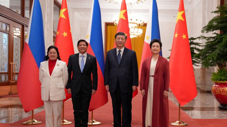 Philippines' President Ferdinand "Bongbong" Marcos Jr. and First Lady Liza Araneta Marcos are photographed with China President Xi Jinping and his wife Peng Li Yuan during a welcoming ceremony at the Great Hall of the People in Beijing