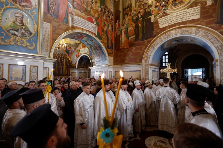 Orthodox priests of the Orthodox Church of Ukraine conduct a ceremony