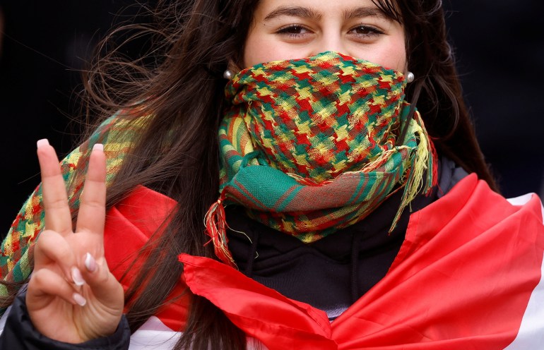 Kurdish protester attends a march