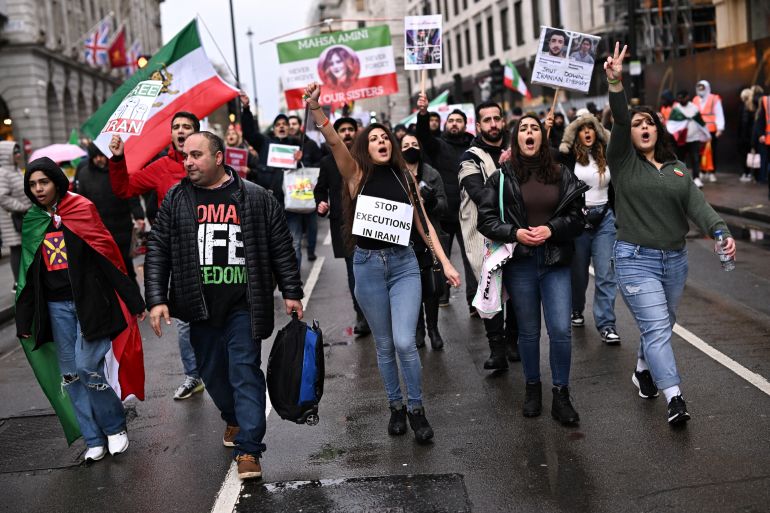 Demonstrators take part in the Iran solidarity rally in London, Britain .