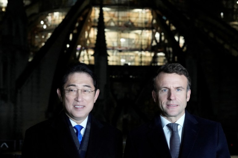 French President Emmanuel Macron and Japanese Prime Minister Fumio Kishida visit Notre-Dame Cathedral